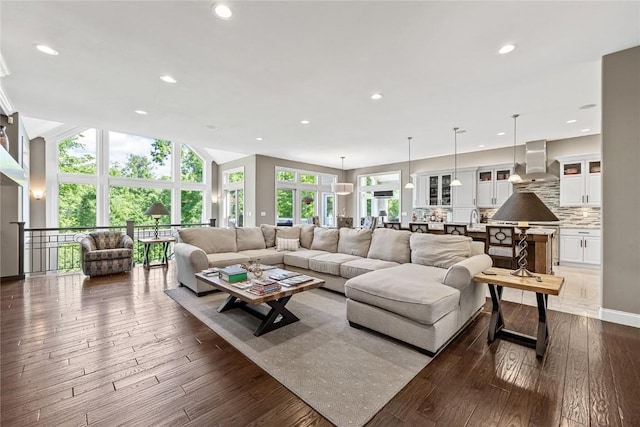 6712 Spring Grove Ct NE, Cedar Rapids, IA 52411 - living area featuring dark wood-type flooring and recessed lighting