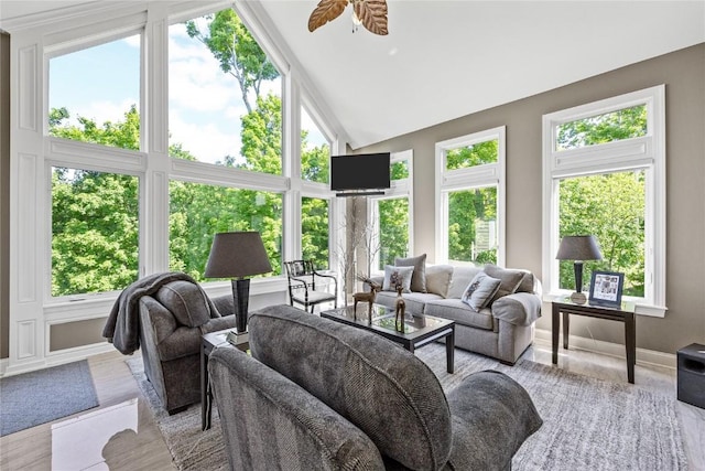 6712 Spring Grove Ct NE, Cedar Rapids, IA 52411 - living room with plenty of natural light, baseboards, a ceiling fan, and high vaulted ceiling