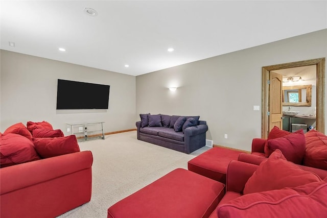 6712 Spring Grove Ct NE, Cedar Rapids, IA 52411 - living area featuring carpet flooring, recessed lighting, and baseboards