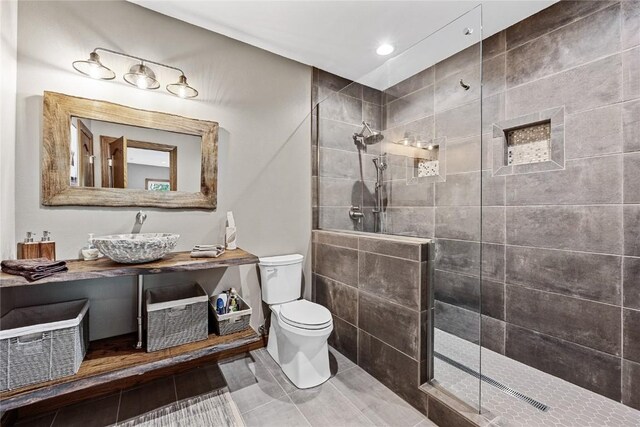 6712 Spring Grove Ct NE, Cedar Rapids, IA 52411 - bathroom with toilet, a walk in shower, vanity, recessed lighting, and tile patterned floors