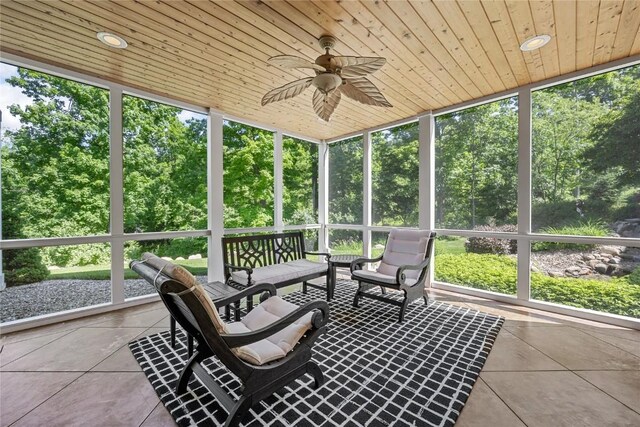 6712 Spring Grove Ct NE, Cedar Rapids, IA 52411 - sunroom / solarium featuring a ceiling fan, outdoor lounge area, and view of scattered trees