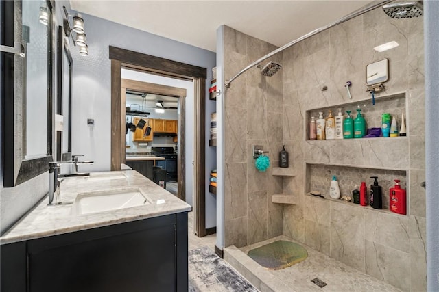 912 N St, Williamsburg, IA 52361 - bathroom featuring vanity and a tile shower