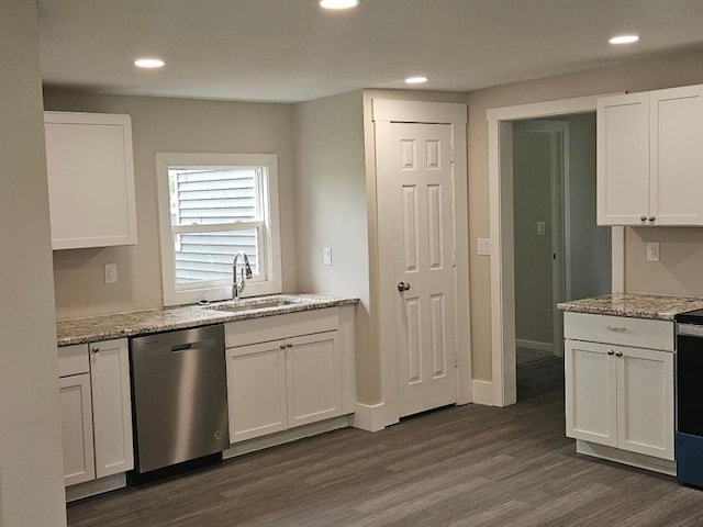 1602 11th Ave, Belle Plaine, IA 52298 - kitchen featuring stainless steel dishwasher, a sink, white cabinetry, recessed lighting, and dark wood-type flooring