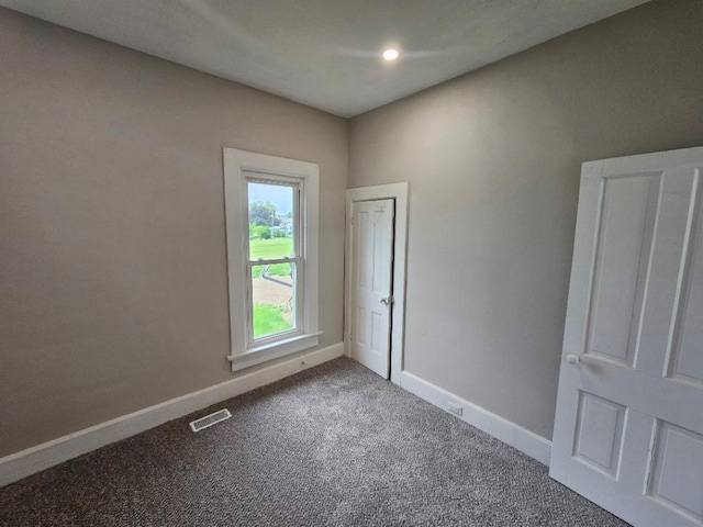 1602 11th Ave, Belle Plaine, IA 52298 - carpeted spare room with baseboards and recessed lighting