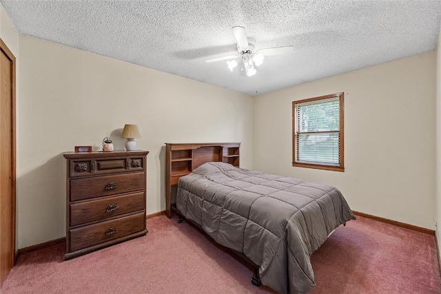 2914 Windy Ridge Rd NE, Swisher, IA 52338 - bedroom with light carpet, a textured ceiling, and ceiling fan