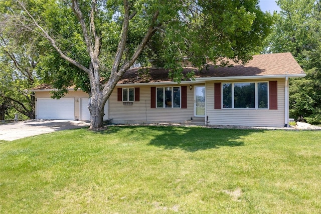2914 Windy Ridge Rd NE, Swisher, IA 52338 - ranch-style house with entry steps, concrete driveway, and a front lawn