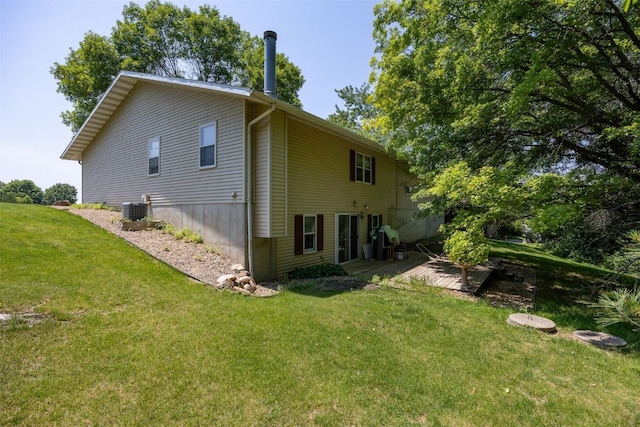 2914 Windy Ridge Rd NE, Swisher, IA 52338 - view of property exterior with a lawn and a deck