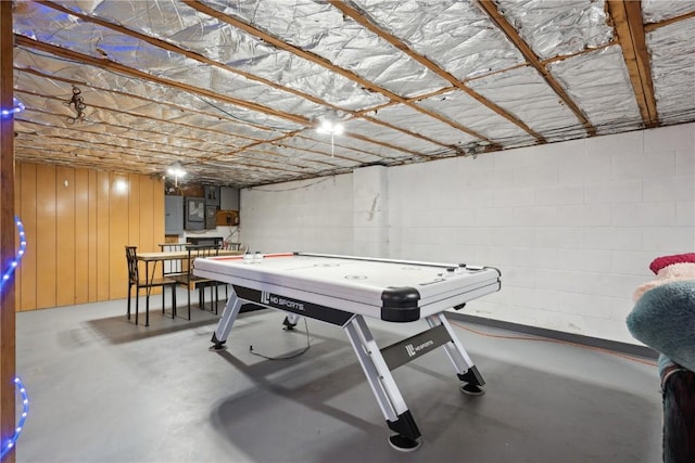 75 Jefferson Ave SW, Swisher, IA 52238 - game room featuring finished concrete floors and concrete block wall