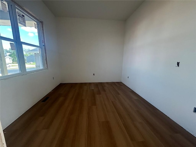 1205 Croell Ave, Tiffin, IA 52340 - empty room with wood finished floors