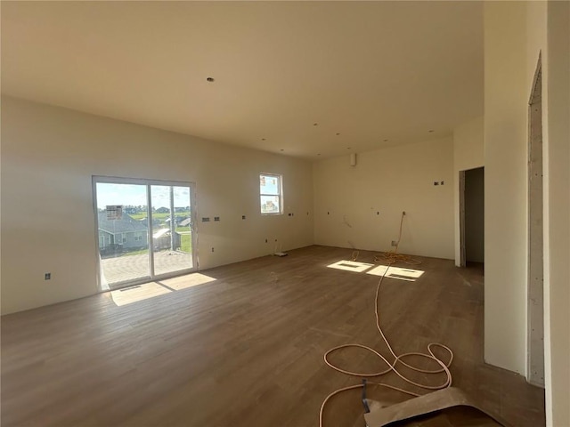 1205 Croell Ave, Tiffin, IA 52340 - unfurnished living room featuring wood finished floors