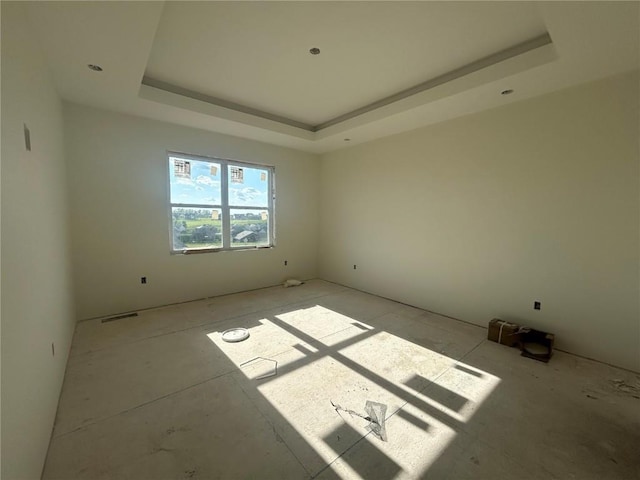 1205 Croell Ave, Tiffin, IA 52340 - spare room with a tray ceiling