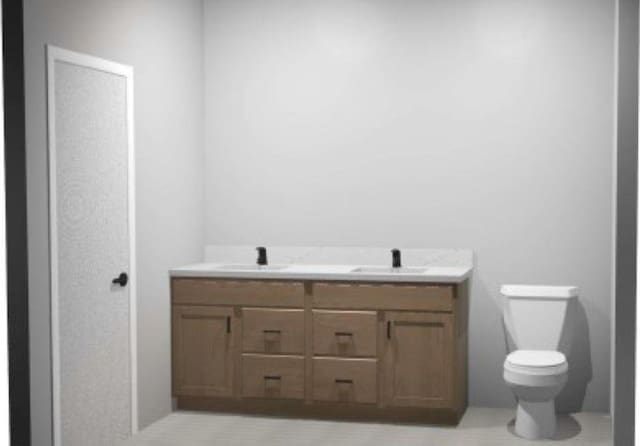 1205 Croell Ave, Tiffin, IA 52340 - bathroom with double vanity and toilet