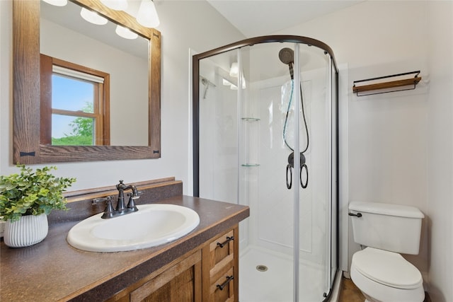 1206 W State St, Williamsburg, IA 52361 - full bath with vanity, a shower stall, and toilet