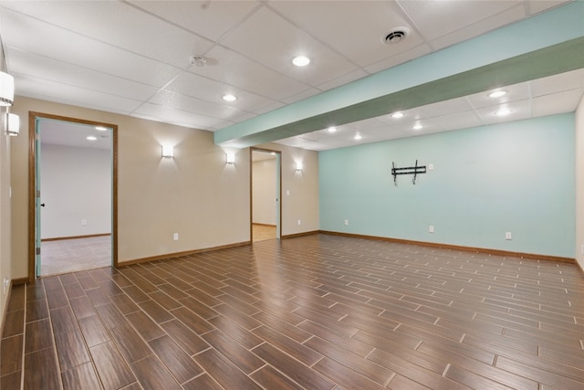 1206 W State St, Williamsburg, IA 52361 - unfurnished room featuring a paneled ceiling, wood finished floors, baseboards, and recessed lighting