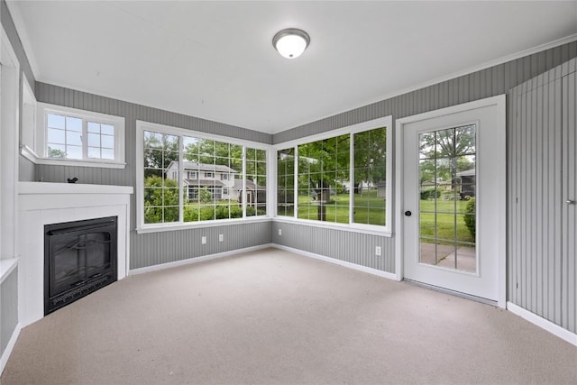 1220 Northwood Ln, Muscatine, IA 52761 - unfurnished sunroom with a glass covered fireplace