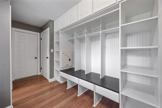 1220 Northwood Ln, Muscatine, IA 52761 - mudroom featuring light wood-type flooring and baseboards