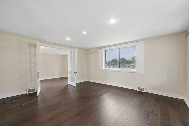 1298 14th Ave, Marion, IA 52302 - spare room featuring baseboards, wood finished floors, recessed lighting, and french doors