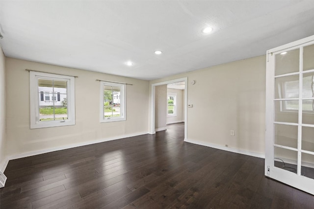 1298 14th Ave, Marion, IA 52302 - empty room with recessed lighting, wood finished floors, and baseboards