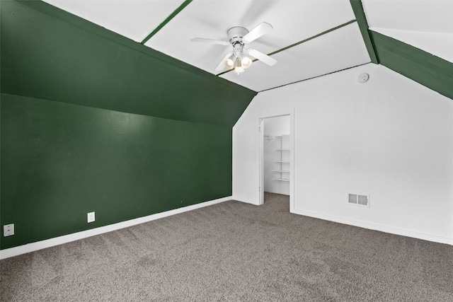 1298 14th Ave, Marion, IA 52302 - additional living space with vaulted ceiling, carpet, a ceiling fan, and baseboards