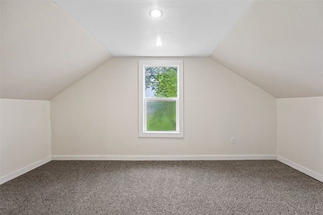 1298 14th Ave, Marion, IA 52302 - additional living space featuring carpet flooring, lofted ceiling, baseboards, and recessed lighting