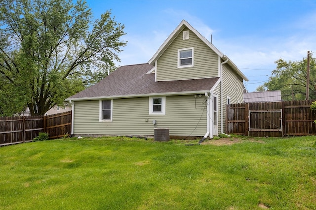 1298 14th Ave, Marion, IA 52302 - rear view of property featuring a shingled roof and central air condition unit