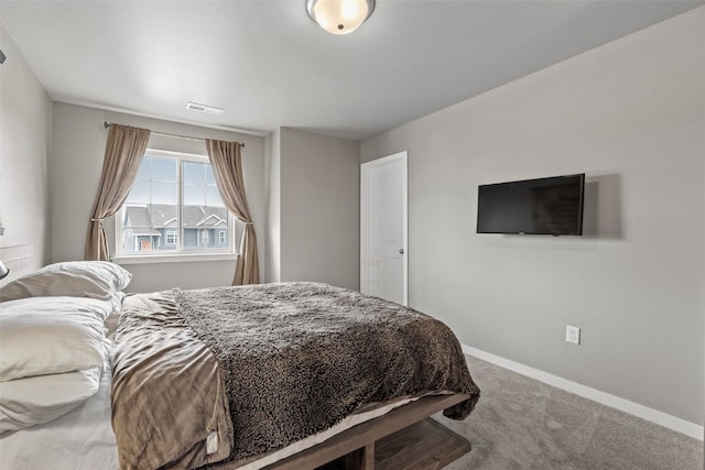 1225 Daisy Cir, North Liberty, IA 52317 - bedroom featuring carpet and baseboards