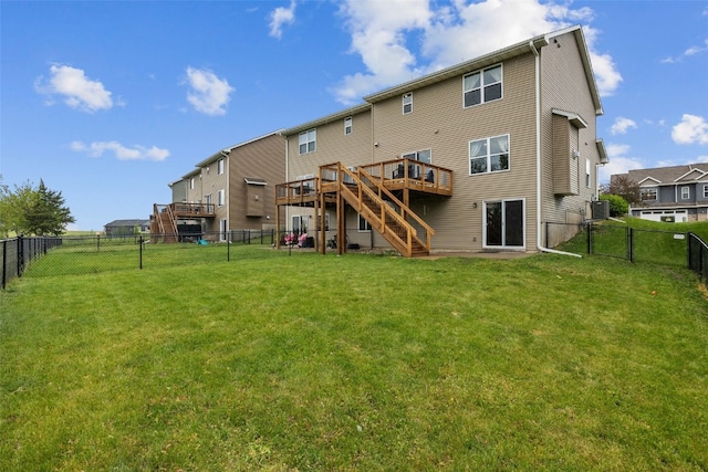 1225 Daisy Cir, North Liberty, IA 52317 - back of house with stairs, a wooden deck, a gate, and central AC