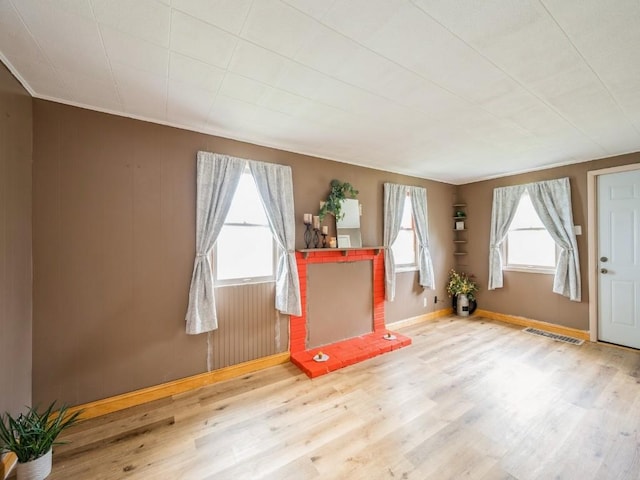 259 25th Ave SW, Cedar Rapids, IA 52404 - empty room featuring wood finished floors and baseboards