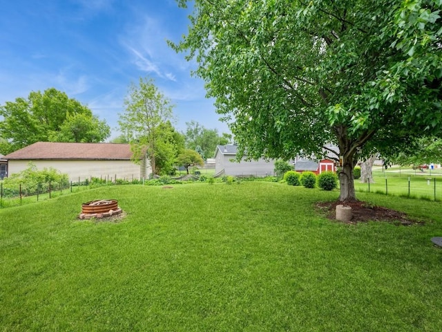 259 25th Ave SW, Cedar Rapids, IA 52404 - view of yard featuring an outdoor fire pit