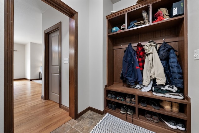 2913 Caspian Rd, Hiawatha, IA 52233 - mudroom featuring baseboards and wood finished floors