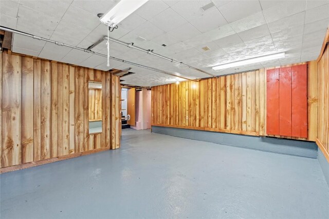 405 6th Ave, Clarence, IA 52216 - finished below grade area featuring wood walls