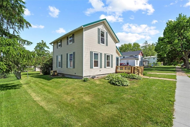 405 6th Ave, Clarence, IA 52216 - view of side of property featuring a yard and a deck