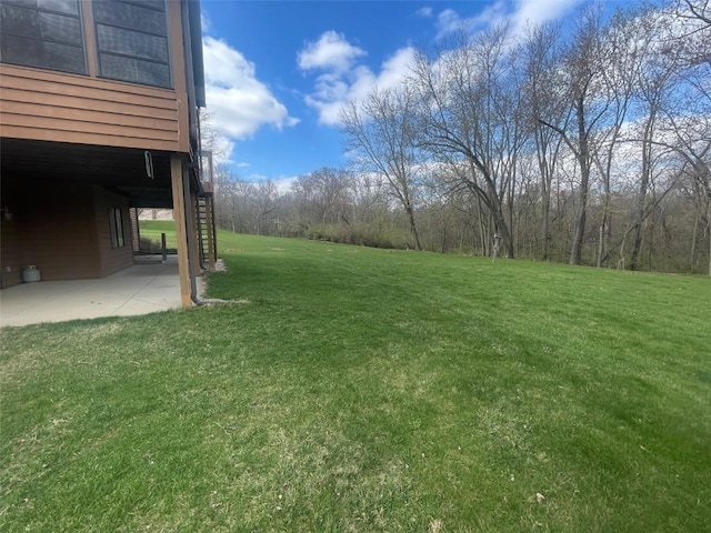 1354 Fox Meadow Ct NE, Swisher, IA 52338 - view of green lawn with stairway and a patio area
