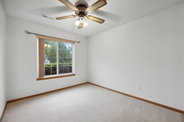 80 Florence Way, North Liberty, IA 52317 - empty room with carpet, baseboards, ceiling fan, and a textured ceiling
