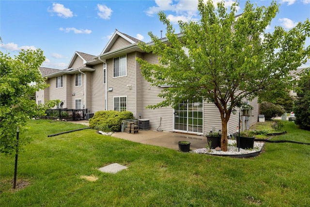 80 Florence Way, North Liberty, IA 52317 - rear view of property with a patio, a yard, and central air condition unit