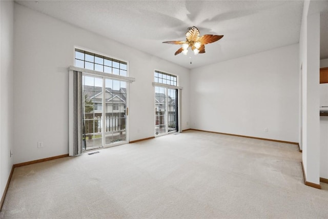 80 Florence Way, North Liberty, IA 52317 - carpeted empty room featuring a ceiling fan and baseboards