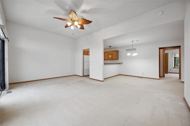 80 Florence Way, North Liberty, IA 52317 - unfurnished living room with light colored carpet, ceiling fan, and baseboards