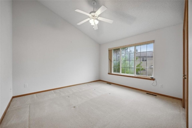 80 Florence Way, North Liberty, IA 52317 - unfurnished room with carpet flooring, baseboards, and vaulted ceiling