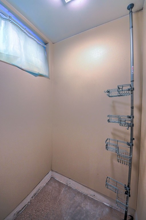 1139 H Ave NE, Cedar Rapids, IA 52402 - empty room featuring concrete flooring