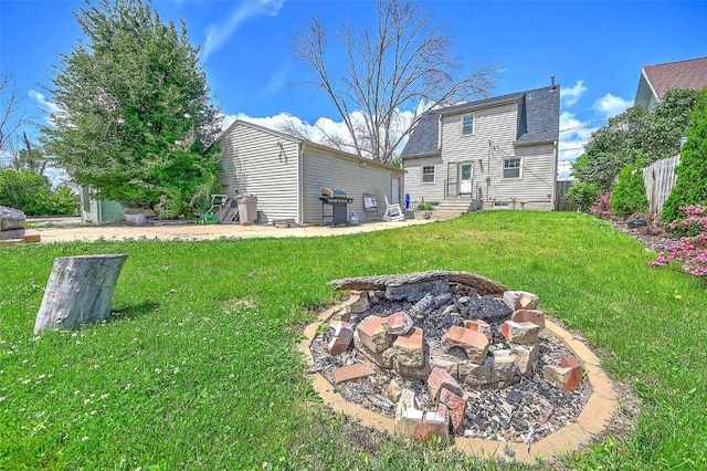 1139 H Ave NE, Cedar Rapids, IA 52402 - back of property with entry steps, a lawn, and a shingled roof