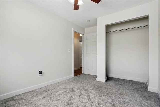 215 40th St Dr SE Unit 304, Cedar Rapids, IA 52403 - unfurnished bedroom with carpet floors, baseboards, a ceiling fan, and a closet