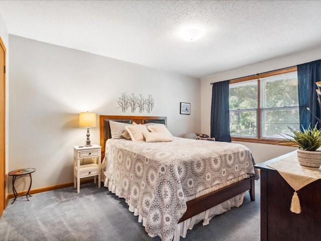 1901 42nd St SE, Cedar Rapids, IA 52403 - carpeted bedroom featuring baseboards and a textured ceiling