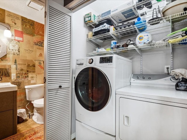 1901 42nd St SE, Cedar Rapids, IA 52403 - laundry area with separate washer and dryer