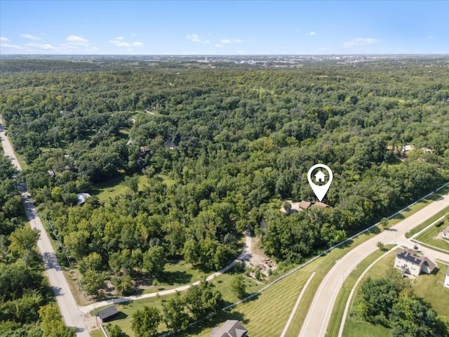 1901 42nd St SE, Cedar Rapids, IA 52403 - aerial view of property and surrounding area featuring a heavily wooded area