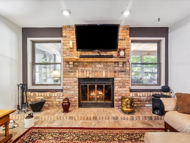 1901 42nd St SE, Cedar Rapids, IA 52403 - living room featuring a fireplace