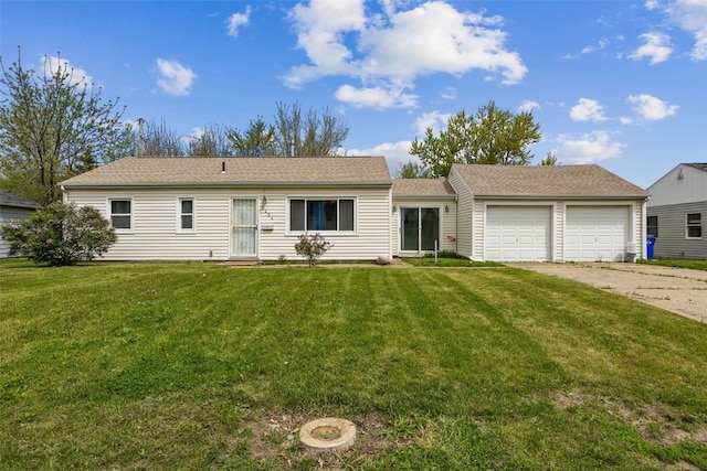 2424 8th Ave SW, Cedar Rapids, IA 52404 - ranch-style house with an attached garage, a front lawn, and driveway