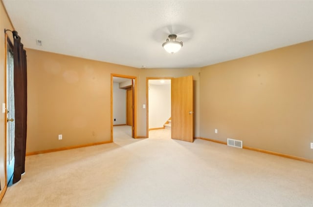 6967 Doubletree Rd NE, Cedar Rapids, IA 52402 - unfurnished room with carpet floors and baseboards
