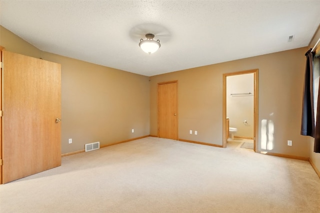 6967 Doubletree Rd NE, Cedar Rapids, IA 52402 - unfurnished bedroom with carpet floors, connected bathroom, and baseboards