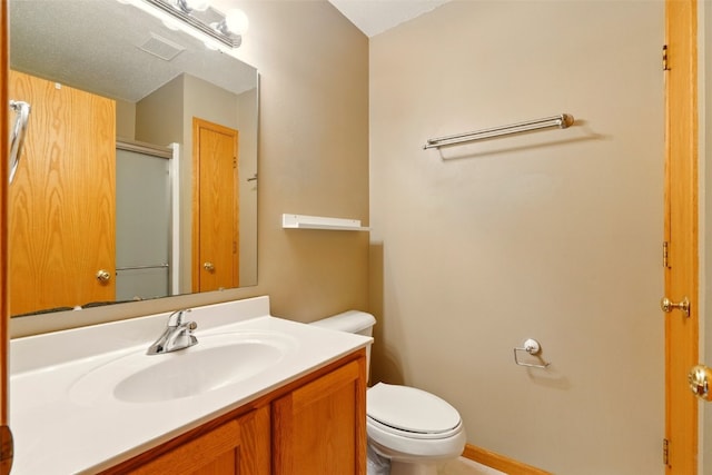 6967 Doubletree Rd NE, Cedar Rapids, IA 52402 - full bath with toilet, a shower with door, and vanity
