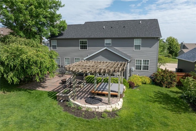 6919 Rockingham Dr SW, Cedar Rapids, IA 52404 - back of property with a pergola, a yard, a patio area, and a shingled roof